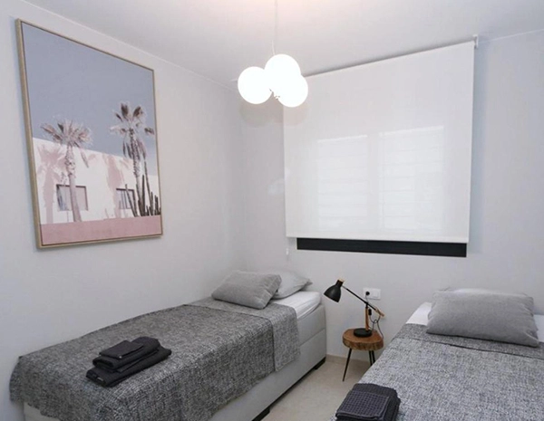 2 dormitorios con jardín